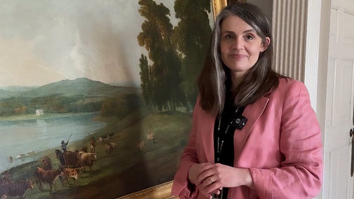 Curator Claire stood in front of Stourhead in its Infancy